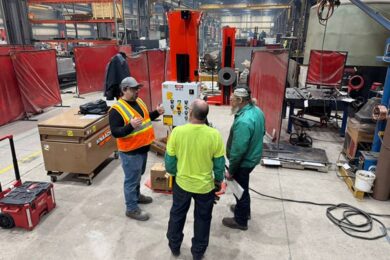 Instructor training two students.